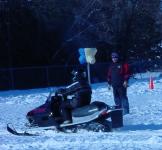 snowmobile and instructor